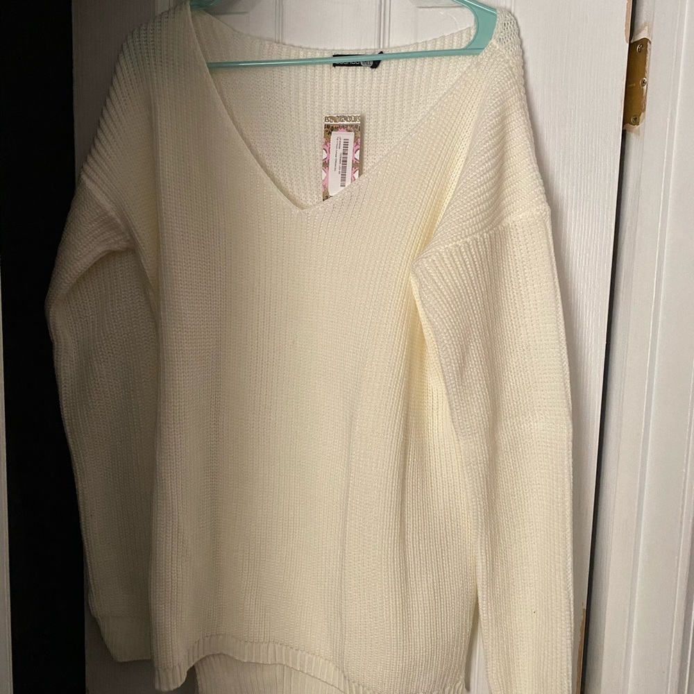 Tall women’s cream and black sweater